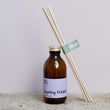 Load image into Gallery viewer, Darjeeling Delights Soy Derived Room Diffuser. Reed Diffuser - Darjeeling Delights. Darjeeling Delights Tea Rose Fragrance. Very romantic, featuring dried tea leaves, dusky tea rose and lemon. Fresh and rose based. Best selling scent, ideal for spring, summer. Hand poured soy derived diffuser made of natural ingredients. Perfect for summer time scenting. Room filling diffuser with 6 natural rattan reeds and comes in a beautoful presentation box, which features wild flowers and animals. Cottagecore theme