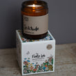 Load image into Gallery viewer, Solitude Scent. Winter Warmer. Fresh and spicy. Features nutmeg, patchouli and ginger notes. Soy wax . Our candles are all hand poured with natural plant based wax. Hand poured in the UK and poured in a brown amber glass by our female owned team. Long lasting candles that fully scent a room. Our candles are complete with a gold alliminium lid and then packaged in a beautiful botanical box, which features candle safety instructions in a cottage core theme. They are long lasting candles, rated excellent