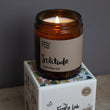 Load image into Gallery viewer, Solitude Scent. Winter Warmer. Fresh and spicy. Features nutmeg, patchouli and ginger notes. Soy wax . Our candles are all hand poured with natural plant based wax. Hand poured in the UK and poured in a brown amber glass by our female owned team. Long lasting candles that fully scent a room. Our candles are complete with a gold alliminium lid and then packaged in a beautiful botanical box, which features candle safety instructions in a cottage core theme. They are long lasting candles, rated excellent