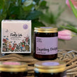 Load image into Gallery viewer, Darjeeling Delights Tea Rose Fragrance. Very romantic, featuring dried tea leaves, dusky tea rose and lemon. Fresh and rose based. Best selling scent, ideal for spring, summer. Hand Poured Soy Wax Candle with botanical box that's perfect for gifting. Also features an elephant as the scent icon.