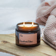 Load image into Gallery viewer, Cosy candle with sweet vanilla and precious woods in amber jar