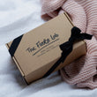 Load image into Gallery viewer, Our sustainably sourced gift boxes are made with sustainable materials, filled with sustainable scent and feature a hand tired cotton ribbon. Perfect for gifts, such as birthday presents, housewarming and sympathy gifts. Bespoke and customisable gift boxes UK.