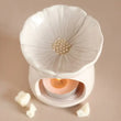 Load image into Gallery viewer, Luxury white ceramic essential oil diffuser and wax melt burner with detailed flower petal bowl, textured center, and artistic arch design for home fragrance