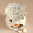 Load image into Gallery viewer, Secret Garden Wax Melt Burner. Botanically designed in the shape of a flower and has petals up the side. Elegant ceramic wax melt burner paired with our handcrafted botanical wax melts and tealights. Stylish home fragrance solution designed for long-lasting and strong scent release. Premium quality ceramic burner with perfect heat distribution for optimal melting of our sustainable, plant-based wax melts. The ideal eco-friendly alternative to conventional room fresheners for the conscious UK home