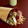 Load image into Gallery viewer, Burgundy Medium Bouquet of dried flowers close up showing a rose, bunny nails and other seasonal foliage.