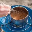 Load image into Gallery viewer, Harth cinnamon hot chocolate being whisked in saucepan - Swiss style spiced preparation