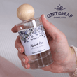 Load image into Gallery viewer, Hand holding a luxury room spray labeled 'Alpine Air' with a wooden cap, against a neutral background. Shortlisted for Home Fragrance Gift of the Year
