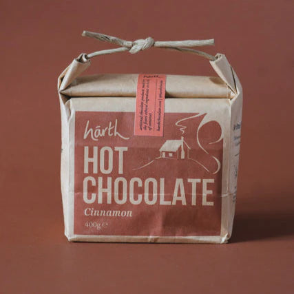 Harth Swiss Style cinnamon hot chocolate powder in biodegradable packaging - vegan organic cocoa with spices