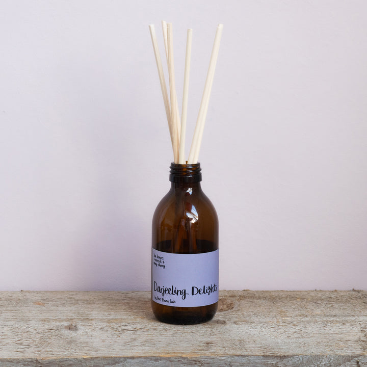 Darjeeling Delights Natural Reed Diffuser Reed Diffuser - Darjeeling Delights. Darjeeling Delights Tea Rose Fragrance. Very romantic, featuring dried tea leaves, dusky tea rose and lemon. Fresh and rose based. Best selling scent, ideal for spring, summer. Hand poured soy derived diffuser made of natural ingredients. Perfect for summer time scenting. Room filling diffuser with 6 natural rattan reeds and comes in a beautoful presentation box, which features wild flowers and animals.  Cottage core theme. 