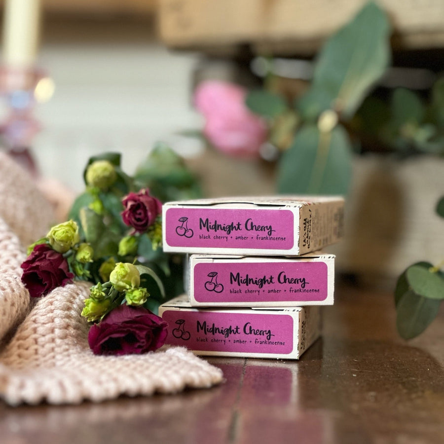 Midnight Cherry Botanical Wax Melts. Hand poured natural soy wax melts. Long lasting and powerful scent. Plastic free and sustainable packaging botanical wax melts. These scented wax tarts are made by a small business. 