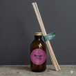 Load image into Gallery viewer, Midnight Cherry scent which features Black Cherry, golden ambers &amp; frankinsense. Very sexy and made for the night time. Tom Ford Dupe. Berry beautiful. Hand poured soy derived diffuser made of natural ingredients. Perfect for summer time scenting. Room filling diffuser with 6 natural rattan reeds and comes in a beautoful presentation box, which features wild flowers and animals on it. Cottage core in its sttyle, it is perfect for nature lovers. 
