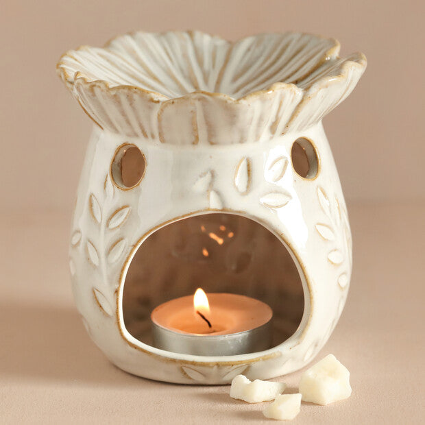 Secret Garden Wax Melt Burner. Secret Garden Wax Melt Burner. Botanically designed in the shape of a flower and has petals up the side. Elegant ceramic wax melt burner paired with our handcrafted botanical wax melts and tealights. Stylish home fragrance solution designed for long-lasting and strong scent release. Premium quality ceramic burner with perfect heat distribution for optimal melting of our sustainable, plant-based wax melts. eco-friendly alternative to conventional room fresheners. Plastic Free 
