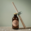 Load image into Gallery viewer, Woodland Glow autumn reed diffuser with vanilla and patchouli scent
