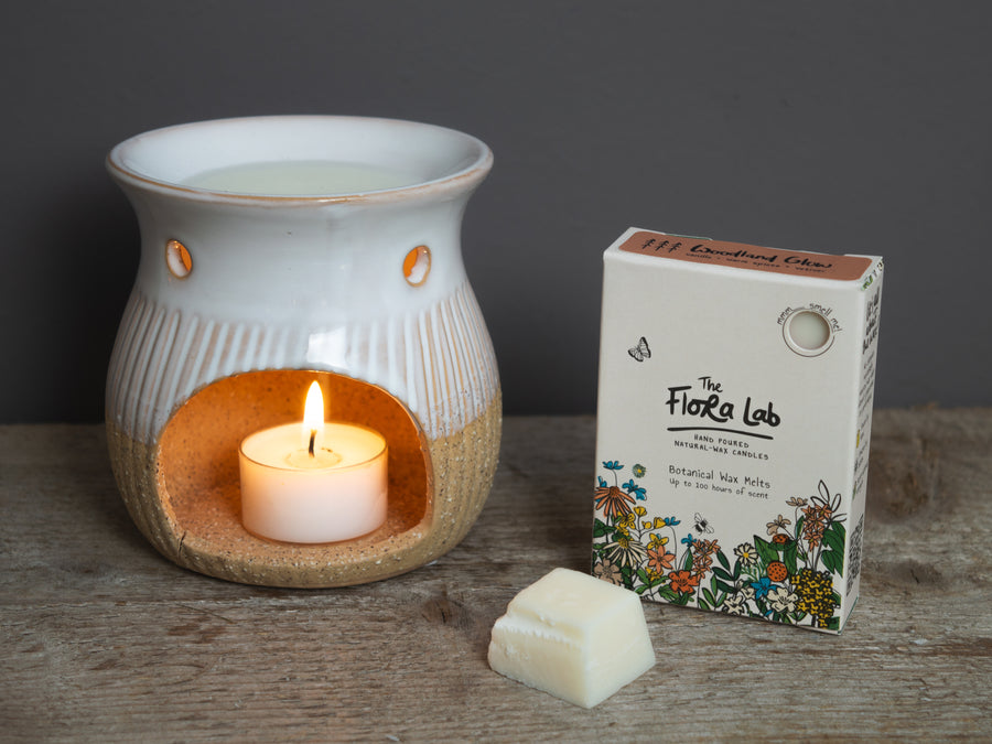 Woodland Glow Botanical Wax Melts. Hand poured natural soy wax melts. Long lasting and powerful scent. Plastic free and sustainable packaging botanical wax melts. These scented wax tarts are made by a small business. 
