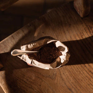 Close-up of Harth cinnamon hot chocolate tin showing plastic-free sustainable packaging and organic spiced blend