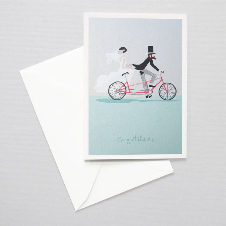 Say congratulations to the happy couple on their wedding day in style with this fun, stylish and modern card. 